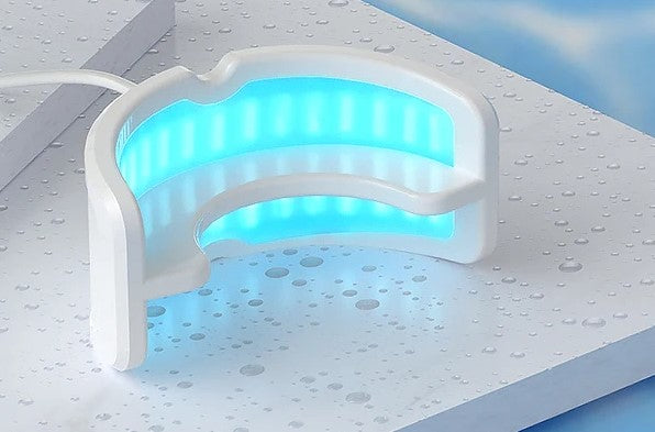 TEETH WHITENING AND GUM CARE SYSTEM